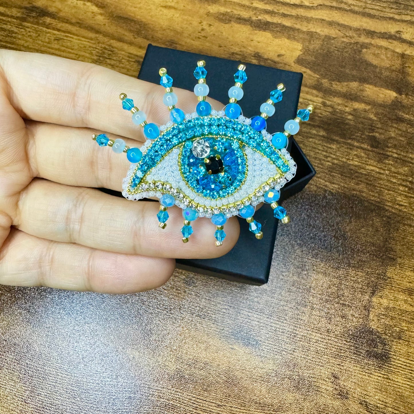 Eye brooches