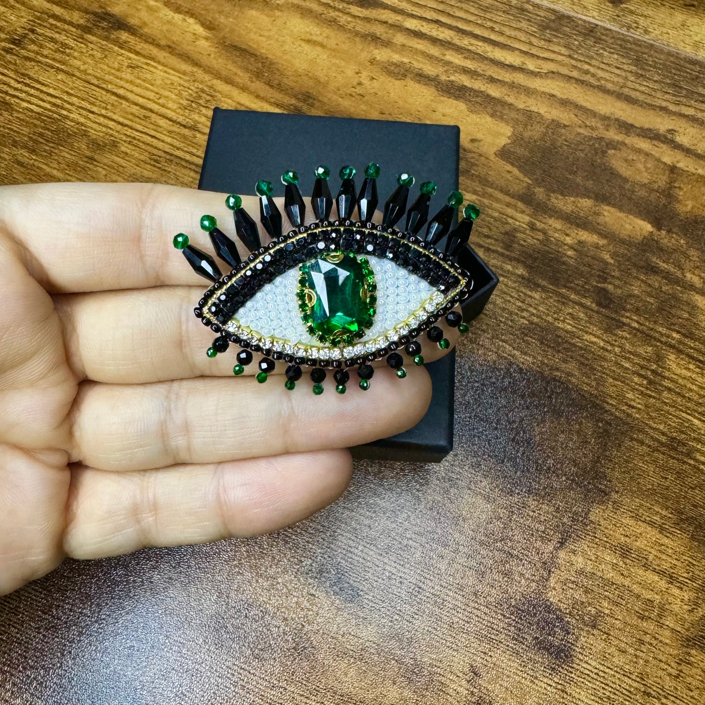 Eye brooches